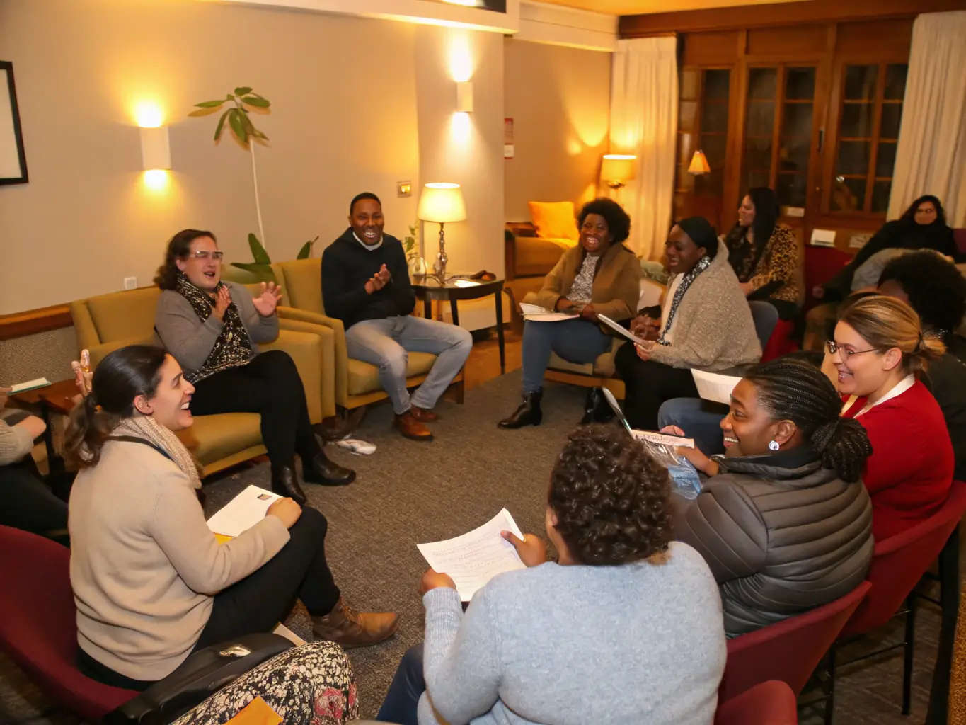 A comforting group session with participants sharing their experiences in a supportive environment, representing Sunset Chapels®' grief support programs.